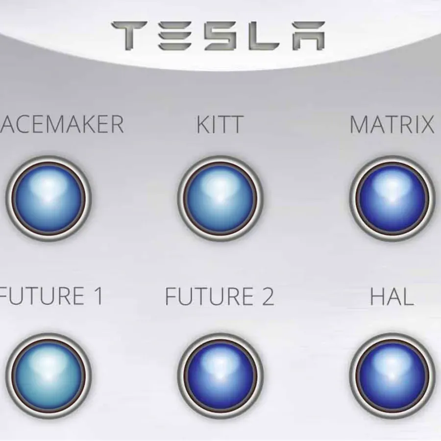 Brushed-metal panel under a TESLA wordmark with glowing blue buttons labelled KITT, Matrix, Future 1, Future 2 and HAL