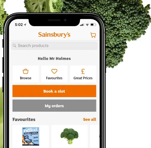 Sainsbury's app home screen on a phone, with broccoli behind it