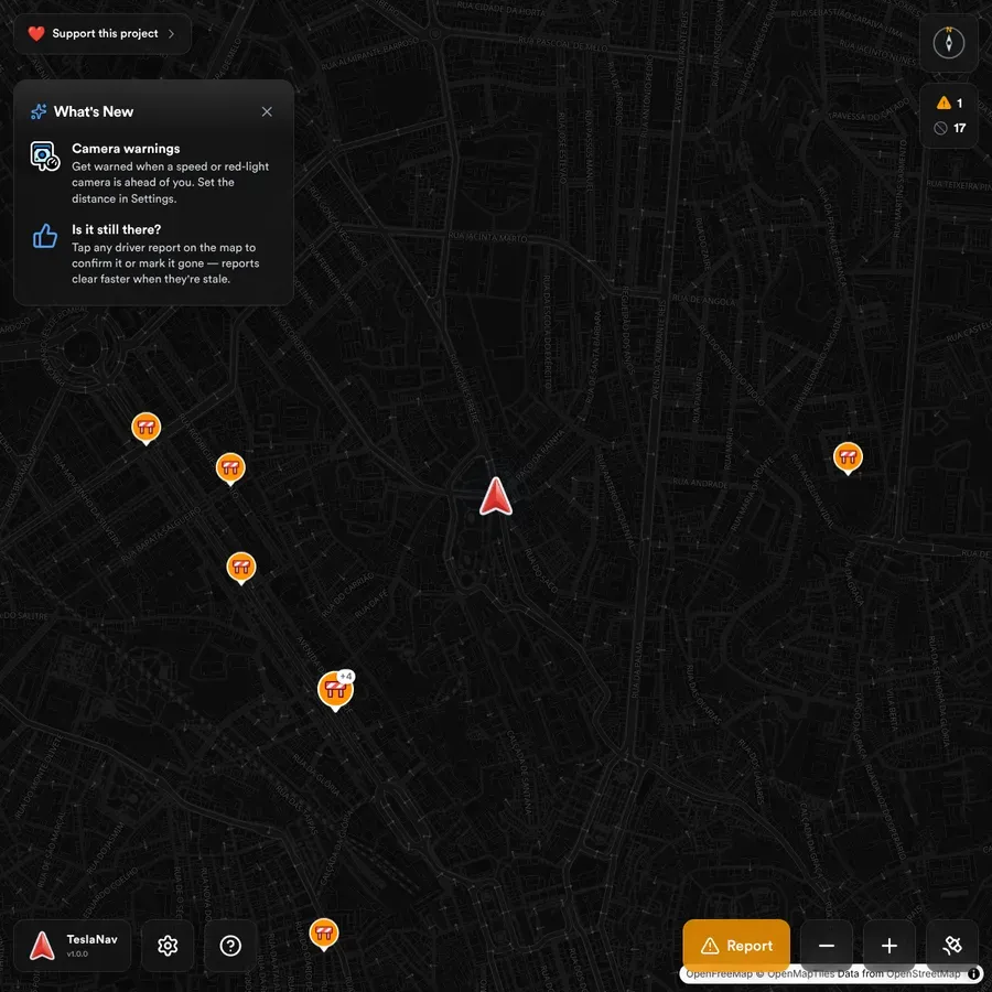 TeslaNav’s dark street map with driver-reported alerts pinned around the car